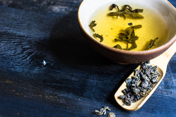 Green tea on wooden table