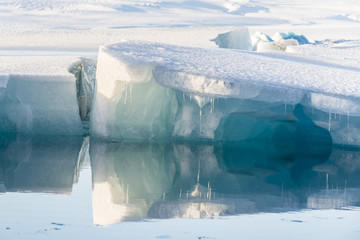 Fototapeta na wymiar Blue icebergs at Jokulsarlon Glacial Lagoon. Iceland. Winter.