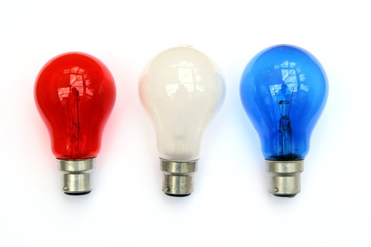 Red white and blue light bulbs in white background - patriotic flag concept