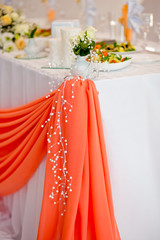 Decorative elements of a wedding table at the wedding banquet