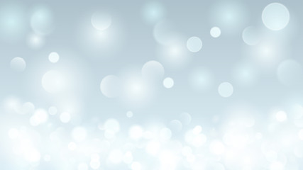 Abstract background with bokeh effect in light blue