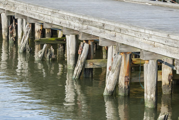 Old and damaged wooden pier
