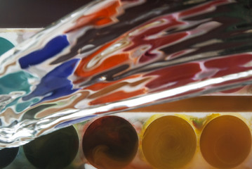 Naklejka premium photo of paints being splashed with water