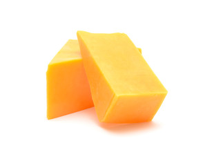 cheddar cheese isolated on white background - obrazy, fototapety, plakaty