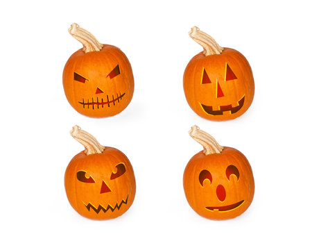 Four Halloween Jack-o-lantern Carved Pumpkins
