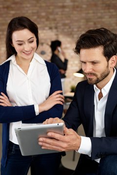 Businesspeople with tablet computer