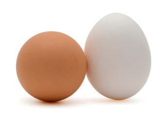 Two white and brown eggs isolated on white background