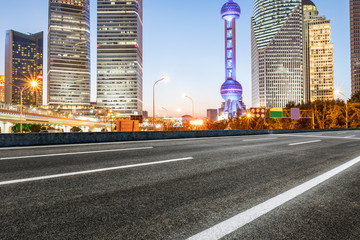 Asphalt roads and the beautiful urban scenery at night in Shanghai,China