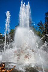 Fototapeta na wymiar Fountain operating at palace gardens of La Granja de san Ildefonso , Segovia, Castile and Leon, Spain 