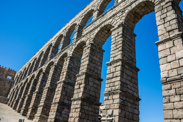Naklejka premium antique roman aqueduct in Segovia, Castilla y Leon, Spain 