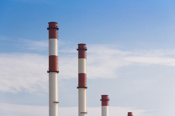 old red and white smoke stacks