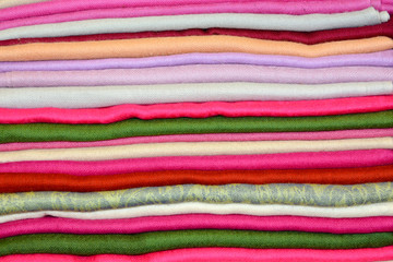 Colored Indian shawls cashmere background 