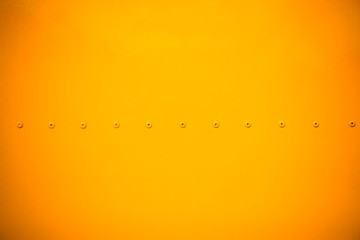 yellow metal sheet with dark vignette free copy space for text,