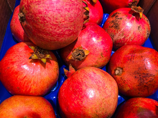 Group of pomegranates. Pomegranate closeup, background