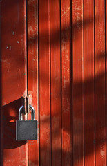 Key lock on the red door.