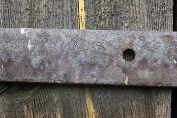 Old wooden door with rusty screw 20438