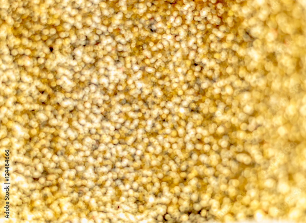 Poster golden color abstract bokeh light background,festive texture