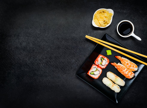 Sushi on Dark Plate with Copy Space