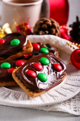 Chocolate and caramel candy decorated Christmas cookies