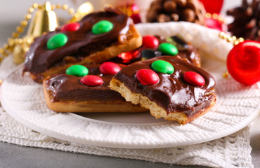Chocolate and caramel candy decorated Christmas cookies