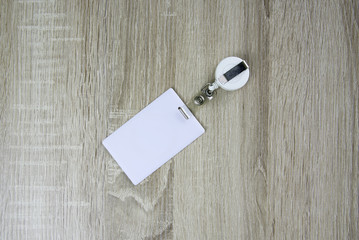 Proximity card on wood table.