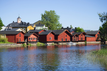 Fototapeta na wymiar View on the ancient coastal barns in Porvoo. Finland