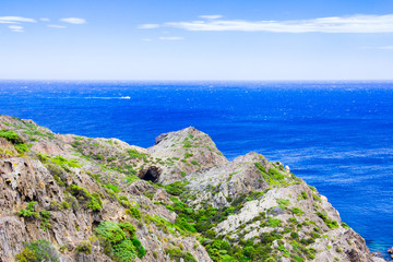 Fototapeta na wymiar Mediterranean coastline, cliffs and bay, Cap de Creus, Costa Brava, Spain. The most eastern point of Spain and the Iberian Peninsula.