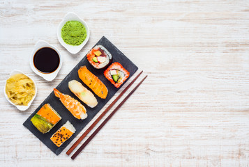 Soy Sauce, Wasabi and Ginger With Japanese Food on Copy Space
