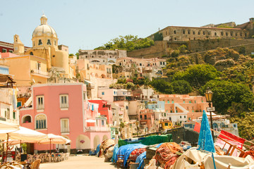 the port of Corricella, with its colorful houses and boats, island of Procida, Naples, Italy