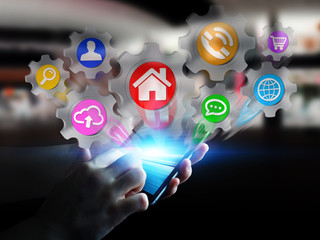Businesswoman holding colorful cogwheel icons