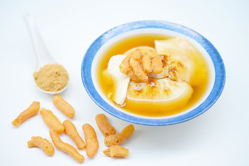 Bean junket eaten hot with gingered syrup, Soy custard
