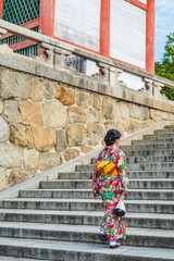 asian woman wearing kimono walking on the old street, Kyoto Japan