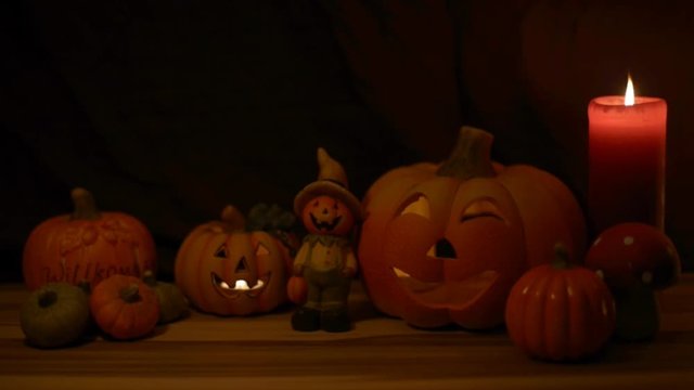 Halloween pumpkin heads lit in the dark