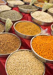 A variety of nuts in the glaze: peanuts, hazelnuts, chestnuts, walnuts, pistachio and pecans. Food and cuisine. (Selective focus)