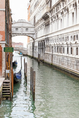 The Bridge of Sighs (Ponte dei Sospiri ) with gondola station in Venice (Italy)