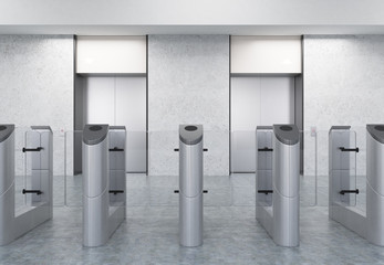 Entrance to office with turnstiles and elevators