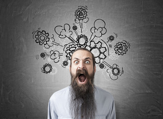 Shouting man with long beard and flying cogs