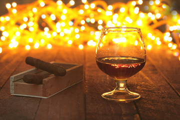 photo cognac glass in front of bokeh background © v_l
