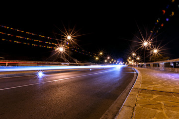 Fototapeta na wymiar Night bridge in Nessebar lit lanterns