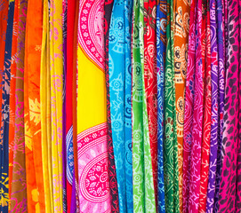 Colorful sarongs on sale in the market at Ubud in Bali, Indonesia.
