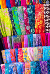 Colorful sarongs on sale in the market at Ubud in Bali, Indonesia.
