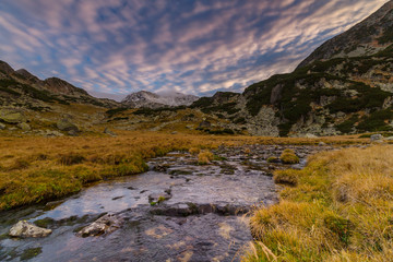 Spectacular mountain scenery in the Alps, with sea of clouds in autumn winter