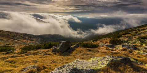 Spectacular mountain scenery in the Alps, with sea of clouds in autumn winter