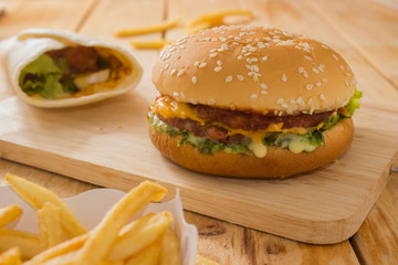 Burger puff and put on a wooden cutting board