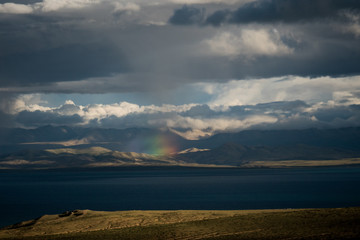 Rainbow above Mountain Lake Manasarovar Himalayas Tibet