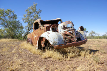 Old rusty abandoned car in outback Australia