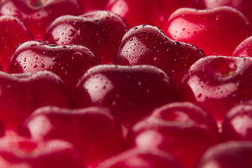 Cherry background. Macro. Ripe fresh rich cherries with drops of water.  Texture.   Fruit background. Food background.