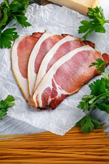 Ingredients for Pasta Bacon, Tomatoes, Garlic, Cheese, Chilli.