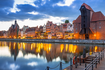 Old town of Gdansk with ancient crane at dusk, Poland