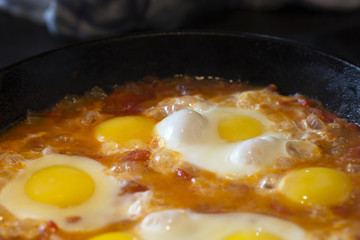 Shakshouka - fried eggs with tomatoes, Israeli national dish.